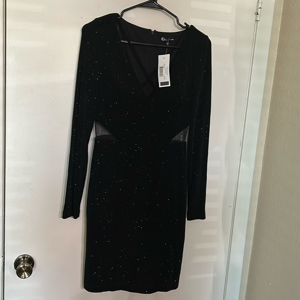 Brand new size 5 black sparkly dress with mesh waist